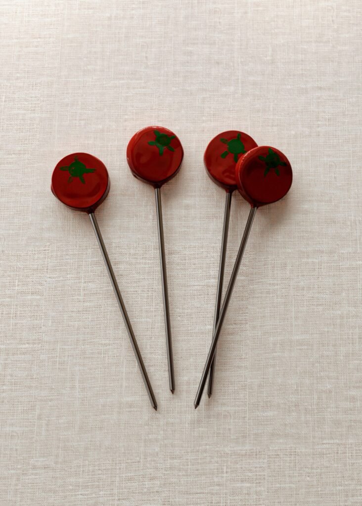 Conjunto de 4 palitos com pega de tomate