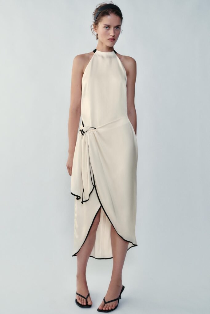 VESTIDO MIDI CRUZADO COM VIVOS EM CONTRASTE