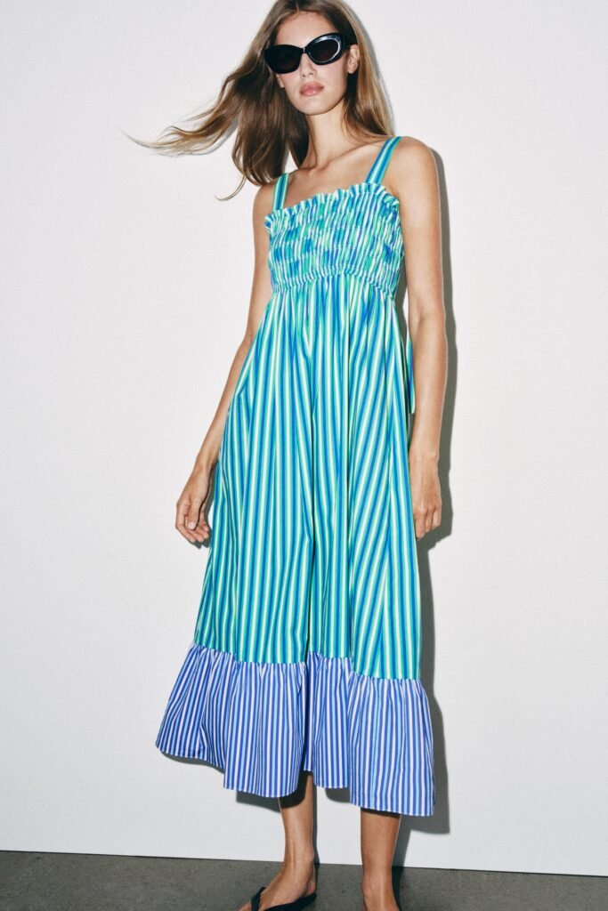 VESTIDO MIDI ÀS RISCAS