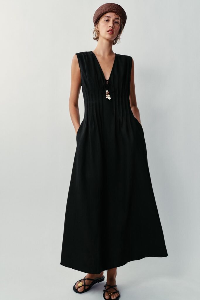 VESTIDO MIDI COM JARETAS EM LINHO